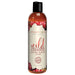 Bottle of Intimate Earth Wild Cherries flavored natural glide lubricant with vegan ingredients label.