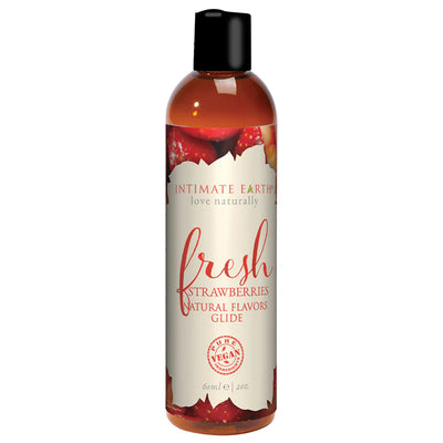 Bottle of Intimate Earth Fresh Strawberries natural flavored water-based glide with vegan ingredients, 60ml size.