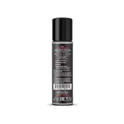 Back view of Wicked Aqua Watermelon water-based lubricant 1oz bottle with product details and ingredients.