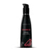 Black pump bottle of Wicked Sensual Care watermelon flavored water-based intimate lubricant, 4 fl oz.