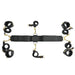 Special Edition under bed restraint set with six adjustable black straps, four faux leather cuffs, golden hardware, and a central connector strap.