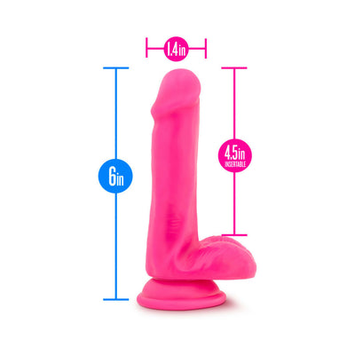 Pink silicone dildo with suction base showing measurements of 6 inches length and 1.4 inches width.