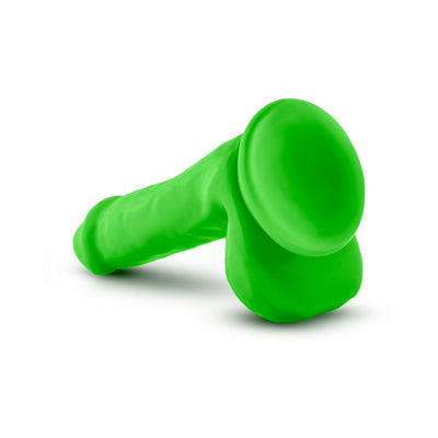 Bright green 6-inch silicone dual density dildo with suction cup base and realistic texture.