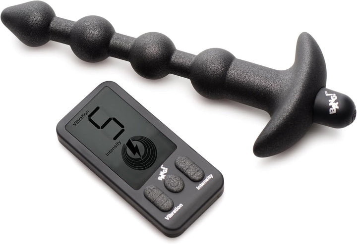Black silicone vibrating anal beads with tapered tip and wide base, shown with a black remote control displaying vibration settings.