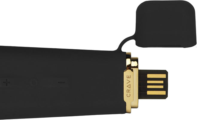 Close-up of black Crave Duet Flex vibrator with gold-accented USB charging plug and attached protective cap.