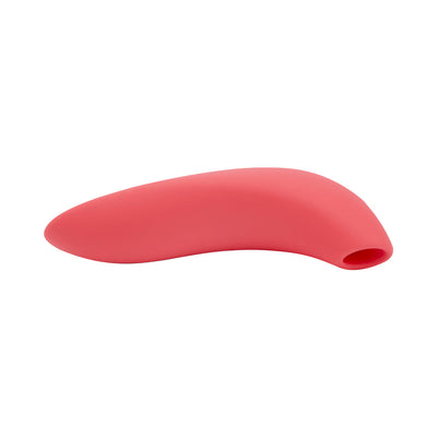 Pink curved clitoral suction stimulator with smooth silicone finish and a rounded mouthpiece opening.