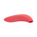 Pink curved clitoral suction stimulator with smooth silicone finish and a rounded mouthpiece opening.