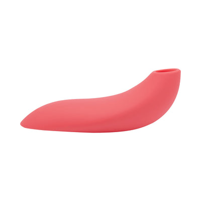 Pink silicone We-Vibe Melt clitoral suction stimulator with smooth curved design and rounded mouthpiece.
