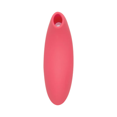 Pink silicone clitoral suction stimulator with a smooth, ergonomic design and oval opening at the tip.