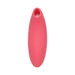 Pink silicone clitoral suction stimulator with a smooth, ergonomic design and oval opening at the tip.