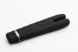 Black dual-tip vibrator with gold accent and control buttons, sleek silicone design on white background.