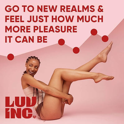 Smiling woman posing playfully against pink background with text promoting Luv Inc pleasure products.