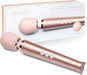 Le Wand Petite rechargeable massager in rose gold with soft rounded head and control buttons displayed with packaging box.