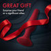 Red tapered silicone anal plug with a red ribbon on a dark textured background, promoting it as a great gift.