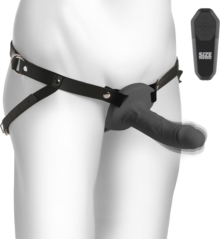 Black realistic vibrating silicone penis sheath with adjustable PU leather harness and remote control on mannequin.