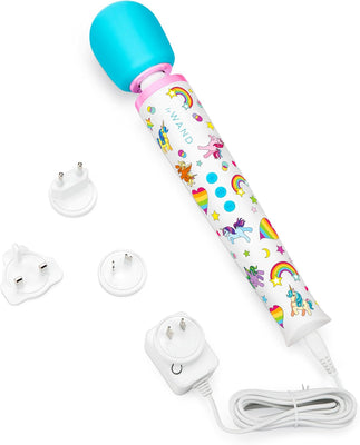 Le Wand Unicorn Wand with blue silicone head, colorful unicorn and rainbow design, and multiple international charger adapters.