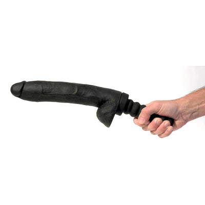 Hand holding a black 10-inch realistic silicone dildo with textured grip handle on white background.