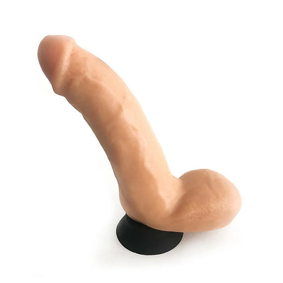 Realistic 8-inch silicone adult toy with suction cup base in flesh tone, designed for hands-free use.