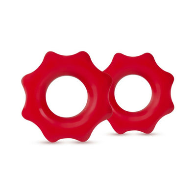 Two red soft and stretchy elastomer cock rings with a wavy outer edge design on a white background.