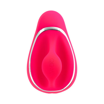 Compact pink handheld silicone sonic vibe with ergonomic design and silver trim detail, front view on white background.