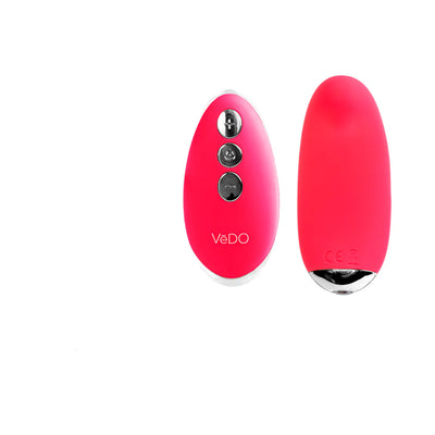 VeDO Niki rechargeable panty vibe and matching remote control in bright pink silicone with silver accents.