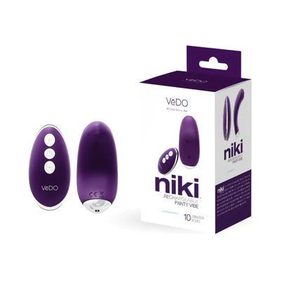 Purple VeDO Niki rechargeable panty vibe with remote control and packaging box on white background.