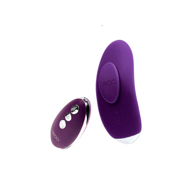 Purple VeDO Niki rechargeable panty vibe with matching remote control on white background