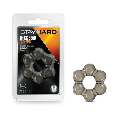 Stay Hard Thick Bead Cock Ring in black, shown in packaging and separately, featuring a stretchy, beaded design.