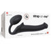 Black silicone bendable strapless strap-on with ergonomic design shown on white packaging box.
