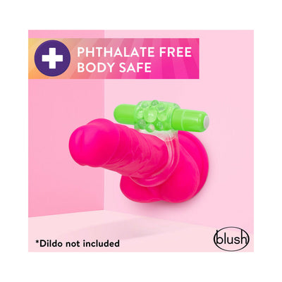 Bright pink vibrating C-ring with green textured bullet vibrator on a pink background, phthalate-free and body safe.