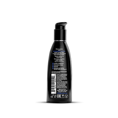 Black pump bottle of Wicked Aqua Blueberry Muffin water-based lubricant with product details on the back label.