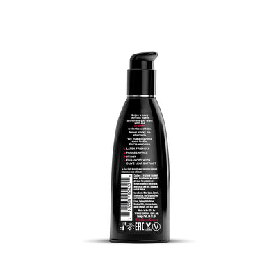 Black pump bottle of Wicked Aqua water-based lube with cherry flavor, featuring product details and usage instructions on the back.