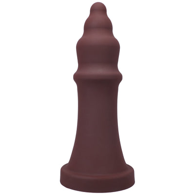 Tantus The Queen premium soft silicone pleasure device in deep brown with a tiered, sculpted design and wide base.