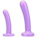 Two smooth purple silicone dildos in different sizes with curved shapes and flat bases.