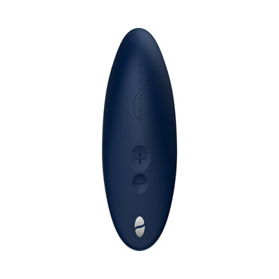 Sleek navy blue We-Vibe Melt clitoral stimulator with two-button control and smooth silicone surface.