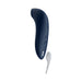 Sleek navy blue We-Vibe Melt clitoral stimulator with curved design and white USB magnetic charging cable.