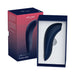 We-Vibe Melt clitoral stimulator in navy blue with sleek curved design, displayed in open box alongside product packaging.