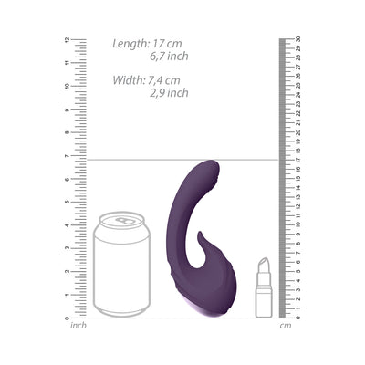 Purple silicone vibrator with curved design shown next to a soda can and lipstick for size comparison.