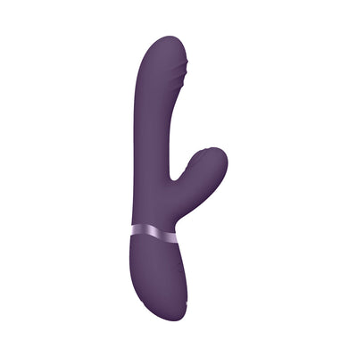 Purple triple-motor silicone vibrator with curved design and textured ridges for targeted stimulation.