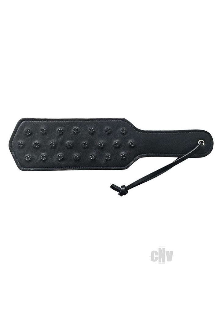 Black leather paddle with rows of metal spikes and wrist strap for impact play.