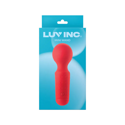 Red silicone mini wand massager displayed on blue Luv Inc packaging with white logo and product name.