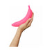 Hand holding a bright pink silicone vibrator shaped like a curved banana with smooth texture.