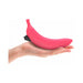 Hand holding a sleek pink silicone vibrator with a curved design and black control button.