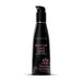 Black pump bottle of Wicked Sensual Care Birthday Cake flavored water-based intimate lubricant, 4 oz.