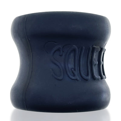 Black silicone hourglass-shaped ballstretcher with embossed SQUEEZE logo and smooth matte finish.