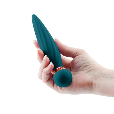 Hand holding a teal silicone Sugar Pop Twist Gyrating Vibrator with a rounded base and textured shaft.