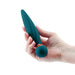 Hand holding a teal silicone Sugar Pop Twist Gyrating Vibrator with a rounded base and textured shaft.