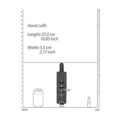 Black leather hand cuff with metal buckles and D-ring, shown with size measurements and comparison to a soda can and lipstick.
