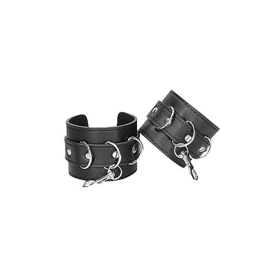 Black leather wrist cuffs with metal D-rings and adjustable straps for secure and comfortable restraint.