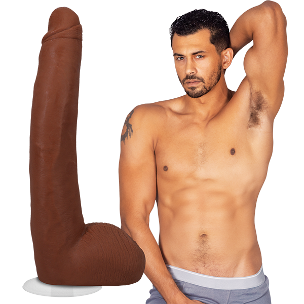 Dark brown 11-inch dual density dildo with lifelike texture and suction cup next to shirtless man posing in gray underwear.
